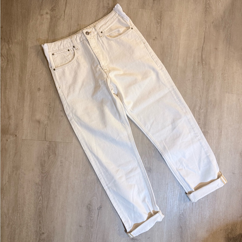ASOS White denim jeans featuring contrast stitching and a branded button closure